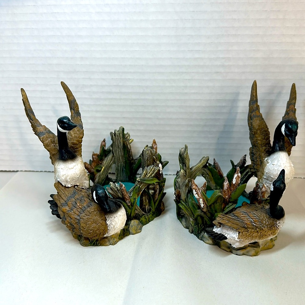Two swan candleholders